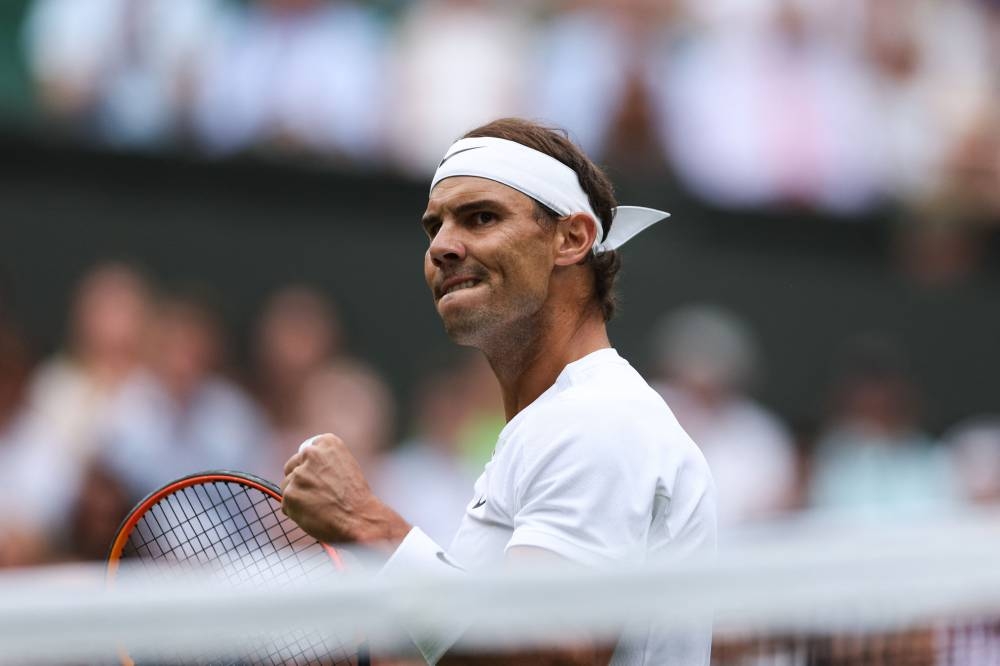 Spain’s Rafael Nadal reacts as he plays against US player Taylor Fritz during their men’s singles quarter final tennis match on the tenth day of the 2022 Wimbledon Championships in London July 6, 2022. — AFP pic