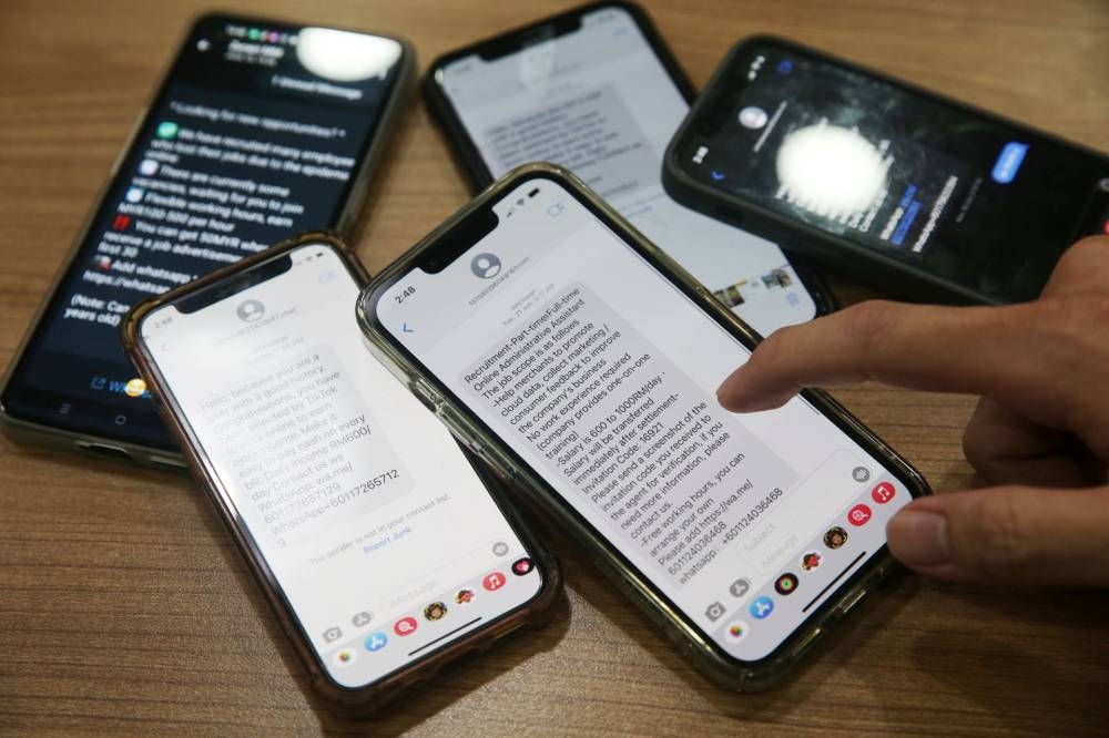 The Malaysian Communications and Multimedia Commission urged the public to protect themselves from falling victim by being alert during online communications as well as avoiding suspicious weblinks, text messages, pop-up windows, email attachments and requests for personal details or money. — Picture by Choo Choy May