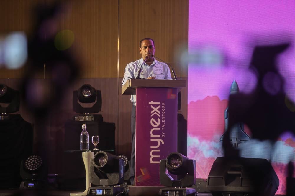 Human Resources Minister Datuk Seri M. Saravanan delivers a speech at mynext by TalentCorp at Sime Darby Convention Centre, August 11,2022. — Picture by Ahmad Zamzahuri