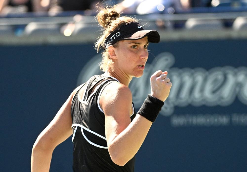 Beatriz Haddad Maia celebrates after winning a point against Iga Swiatek at the Sobeys Stadium in North York August 11, 2022. — Reuters pic