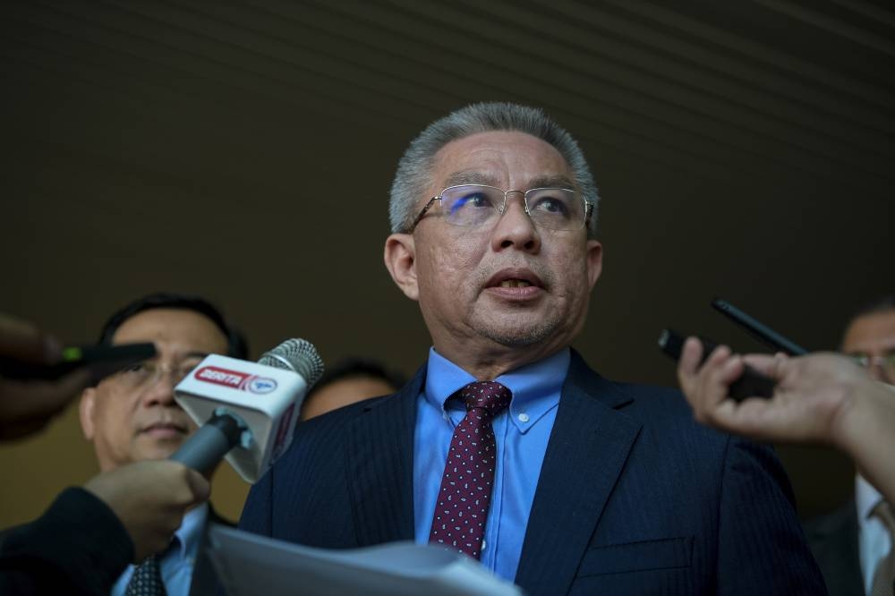 Science, Technology and Innovation Minister Datuk Seri Dr Adham Baba speaks to the media after the signing of the MoU at the UTM campus in Kuala Lumpur, August 12, 2022. — Bernama pic 