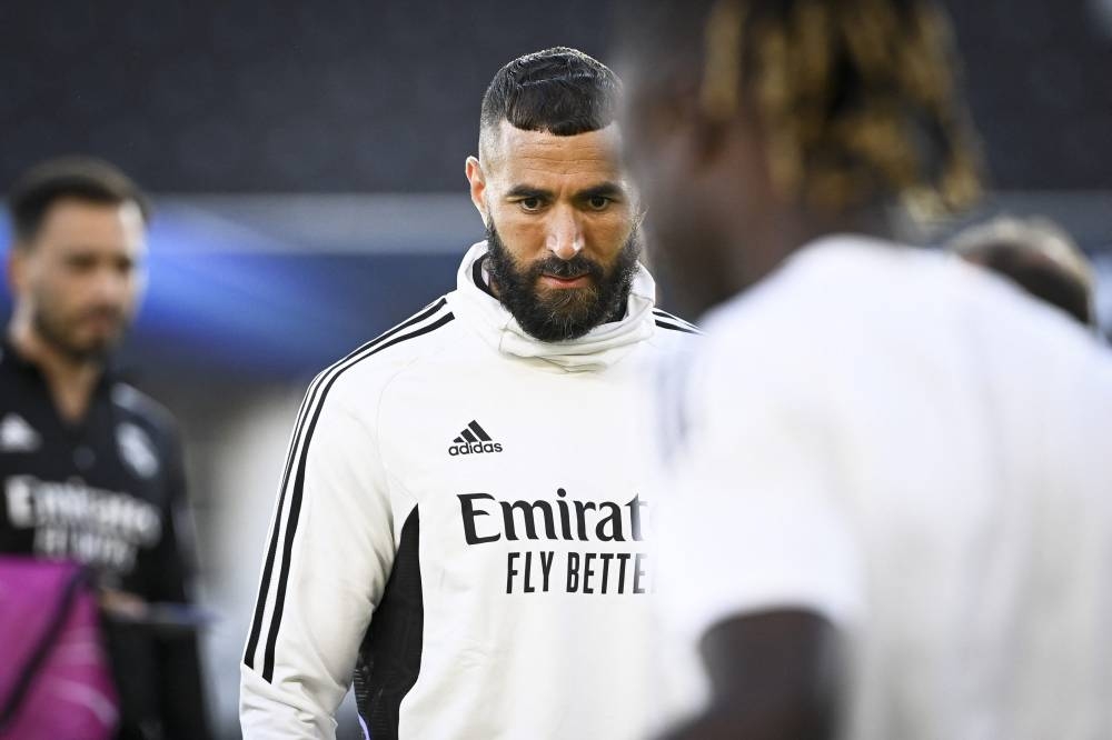 Real Madrid forward Karim Benzema looks down during a training session one day prior to the Uefa Super Cup football match between Real Madrid vs Eintracht Frankfurt at the Olympic stadium in Helsinki, August 9, 2022. — AFP pic 