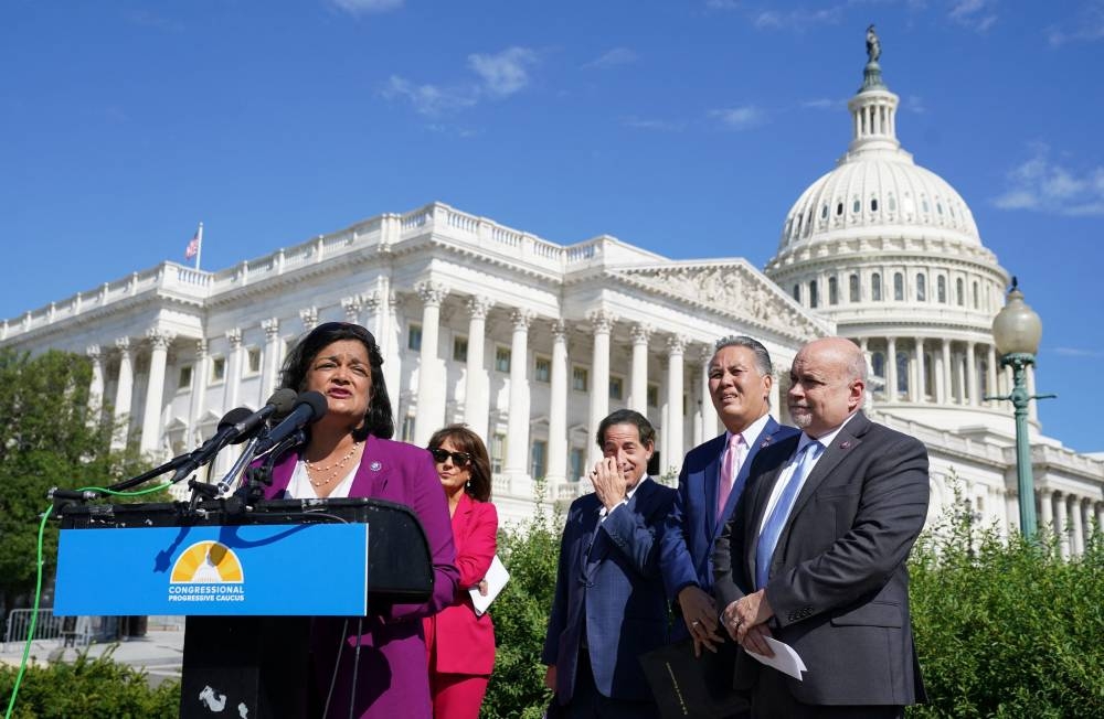 US Rep. Pramila Jayapal (D-WA), chair of the Congressional Progressive Caucus, and other caucus members hold a news conference in advance of the expected House passage of H.R. 6376, the 'Inflation Reduction Act of 2022' at the US Capitol in Washington, DC, US, August 12, 2022. — Reuters pic