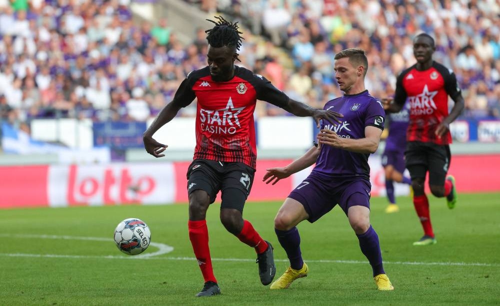Seraing’s Junior Marsoni Sambu and Anderlecht’s Sergio Gomez fight for the ball during a match between RSCA Anderlecht and RFC Seraing, August 7, 2022 in Anderlecht, Brussels, during the 2022-2023 Jupiler Pro League first division of the Belgian championship. — Belga pic via Reuters 
