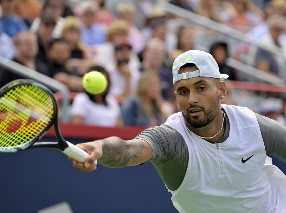 Nick Kyrgios hits a forehand against Hubert Hurkacz (not pictured) in quarterfinal play in the National Bank Open at IGA Stadium August 12, 2022. ― Eric Bolte-USA TODAY Sports via Reuters