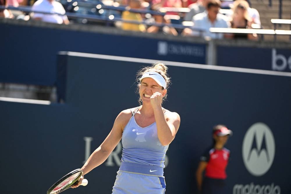 Simona Halep reacts after defeating Coco Gauff (not pictured) at Sobeys Stadium in Toronto August 12, 2022. ― Dan Hamilton-USA TODAY Sports via Reuters