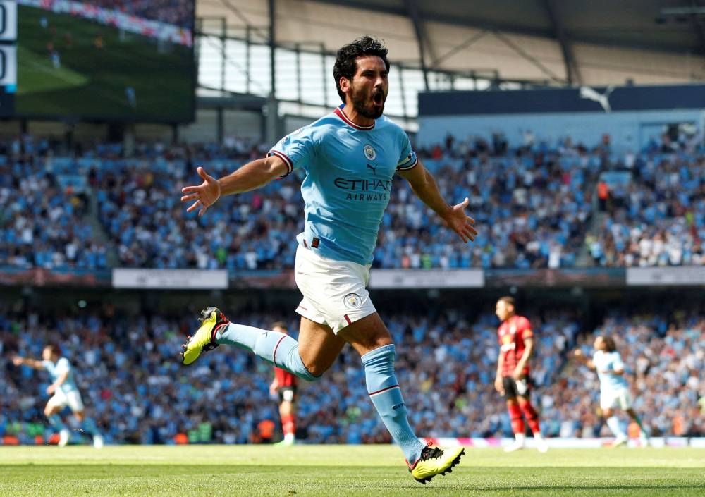Manchester City's Ilkay Gundogan celebrates scoring their first goal against Bournemouth at the Etihad Stadium, Manchester August 13, 2022. — Reuters pic 