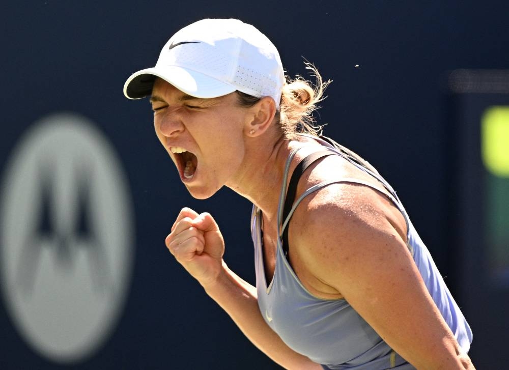 Simona Halep reacts after defeating Jessica Pegula at Sobeys Stadium Toronto August 13, 2022. — Reuters pic 