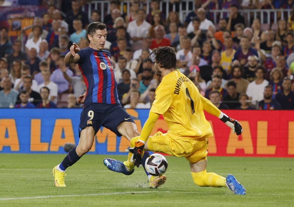Barcelona's Robert Lewandowski scores their first goal against Rayo Vallecano before it is disallowed at Camp Nou, Barcelona August 13, 2022. — Reuters pic