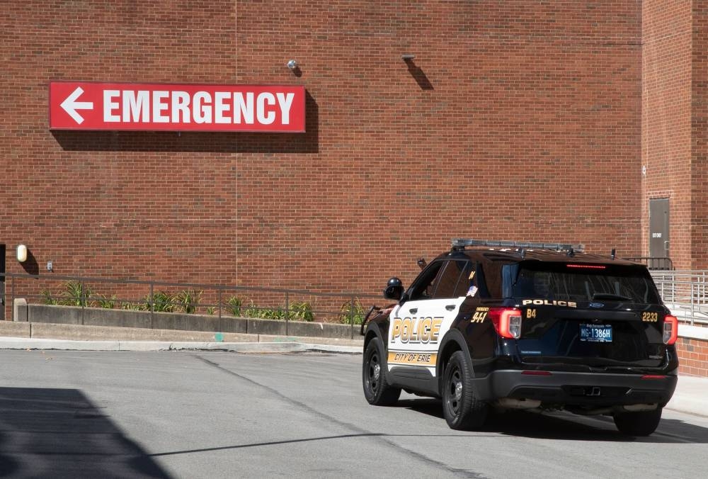 A police vehicle sits in front of the UPMC Hamot Surgery Center in Erie, Pennsylvania, on August 13, 2022, where Indian-born British-American novelist Salman Rushdie is being treated. - Salman Rushdie, who spent years in hiding after an Iranian fatwa ordered his killing, was on a ventilator and could lose an eye following a stabbing attack at a literary event in New York state on August 12, 2022. — AFP pic