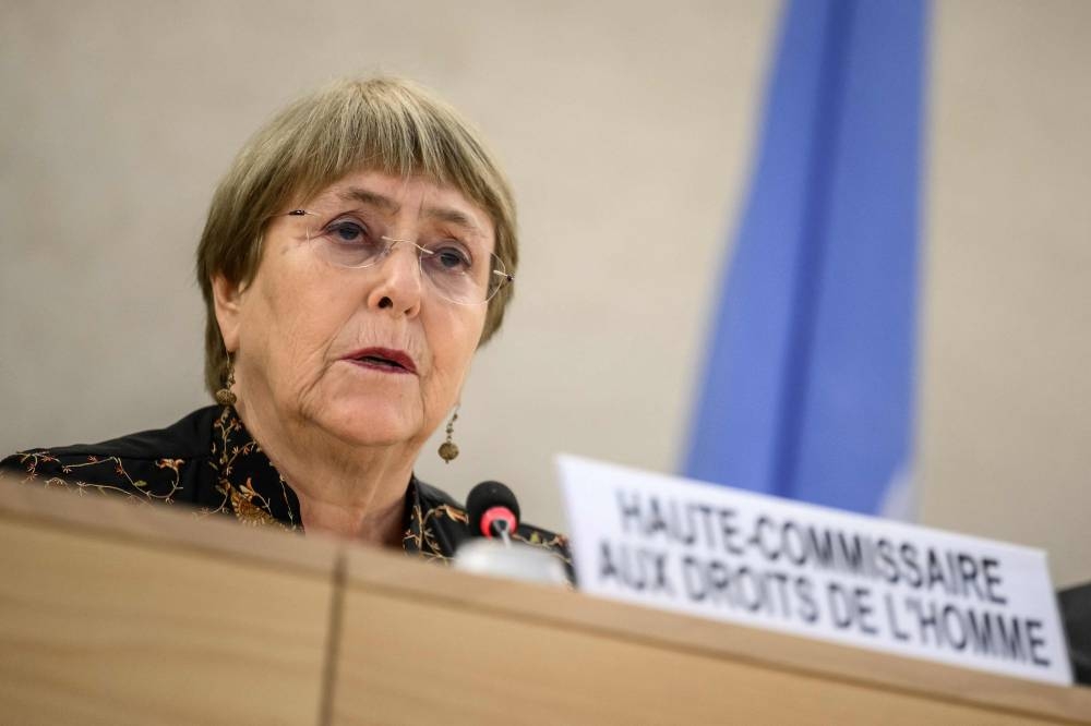 United Nations High Commissioner for Human Rights Michelle Bachelet delivers a speech at the opening day of the 50th session of the UN Human Rights Council, in Geneva on June 13, 2022. — AFP pic