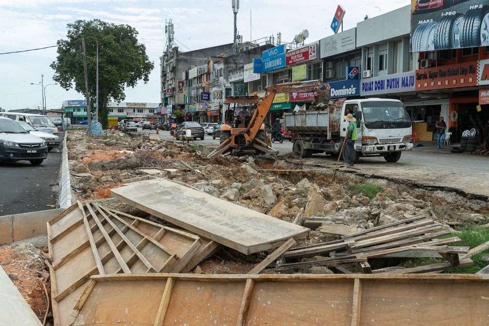 Road and drainage works seen being done along Jalan Teluk Pulai in Taman Melawis, Klang in July 2022. — Picture by Devan Manuel