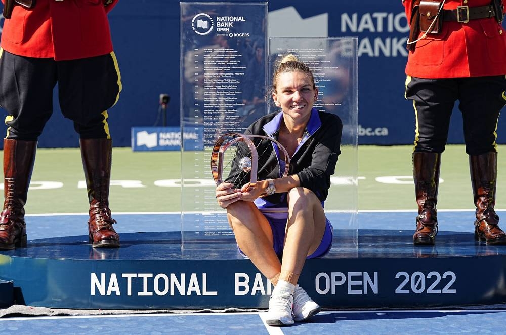 Simona Halep poses with the trophy after defeating Beatriz Haddad Maia in the women's final of the National Bank Open at Sobeys Stadium, Toronto August 14, 2022. — Reuters pic 