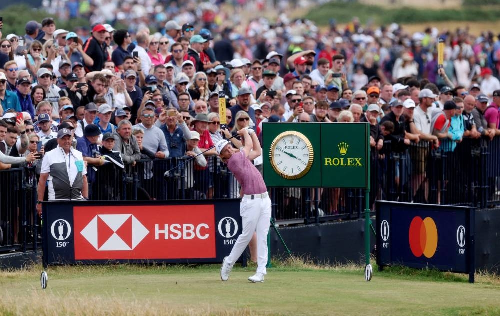 Cameron Smith tees off on the 6th during the final round of The Open Championship in St Andrews, Scotland July 17, 2022. — Reuters pic