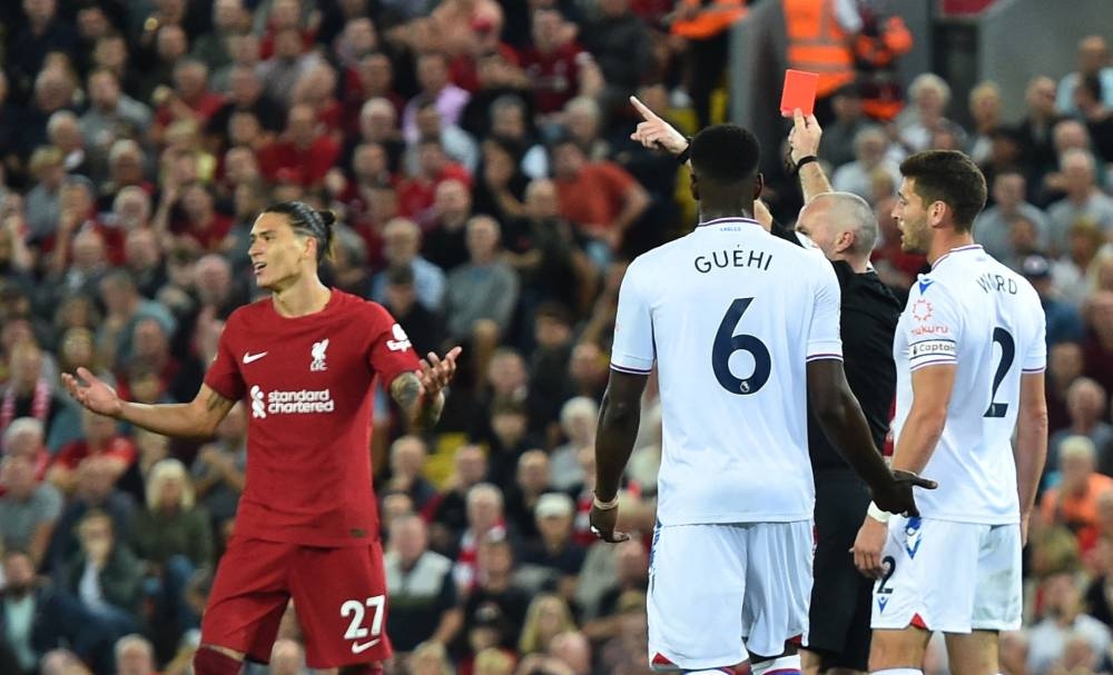 Liverpool's Darwin Nunez is shown a red card by referee Paul Tierney during the match against Crystal Palace at Anfield, Liverpool August 15, 2022. — Reuters pic