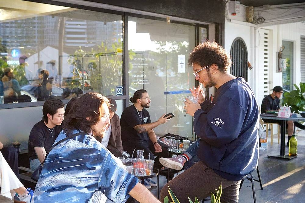 Community and conversation at Lot 21, PJ - where you can get a coffee to go with your haircut. – Pictures by Kenny Mah and courtesy of Ellipsis