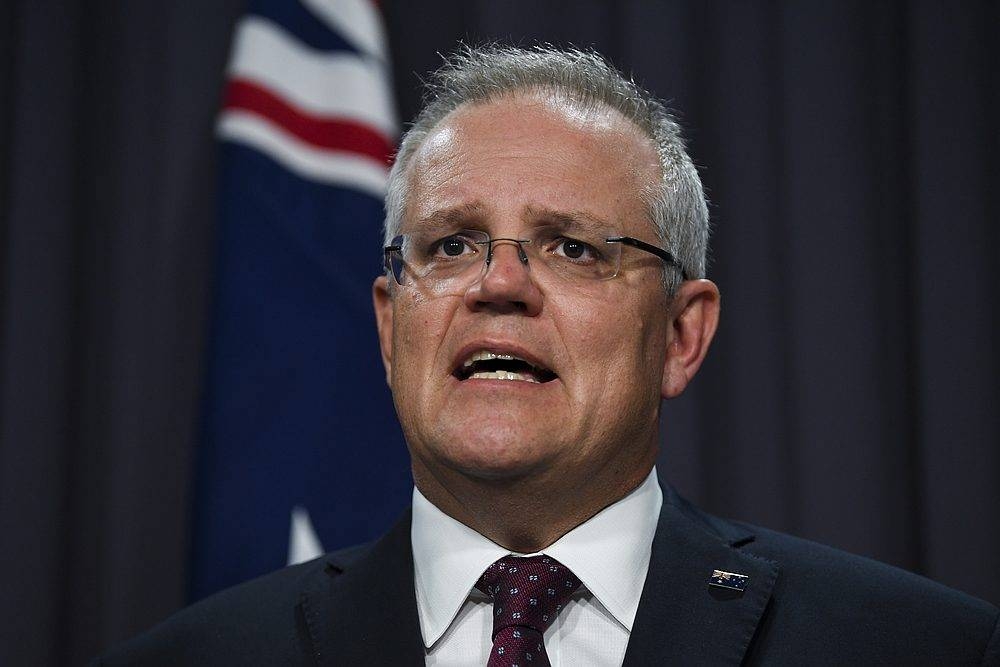 Morrison, who lost office in a national election in May, said in a radio interview today he didn’t make the arrangements public because they were a safeguard only and the ministerial powers for health and finance were not triggered. — AAP Image/Lukas Coch pic via Reuters