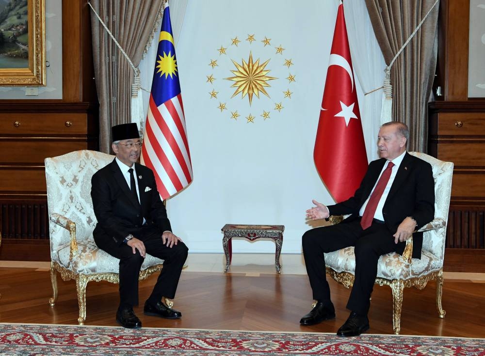 Yang di-Pertuan Agong Al-Sultan Abdullah Ri'ayatuddin Al-Mustafa Billah Shah speaks to Turkey President Recep Tayyip Erdogan during a visit to the the Presidential Palace in Ankara August 16, 2022. — Bernama pic
