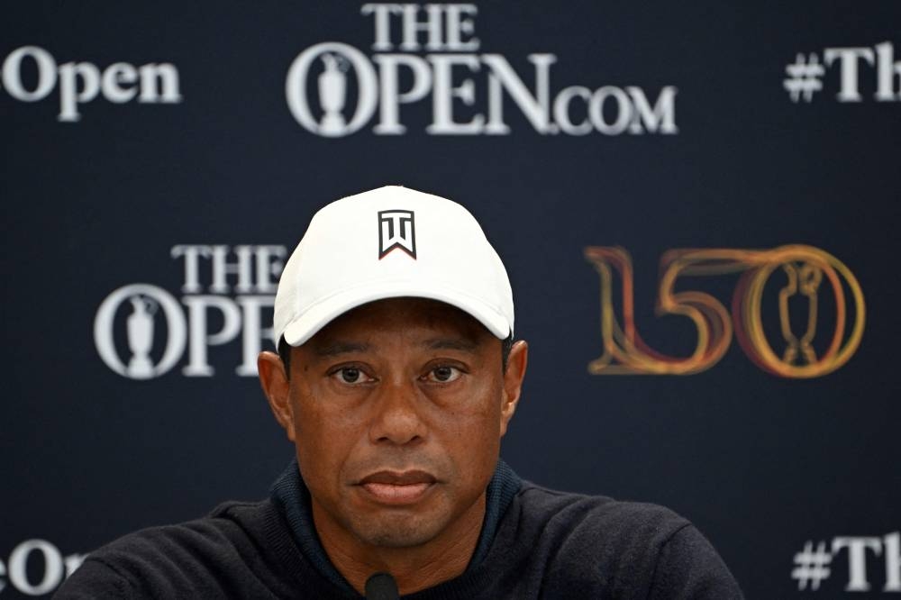 US golfer Tiger Woods attends a press conference held ahead of The 150th British Open Golf Championship on The Old Course at St Andrews in Scotland, July 12, 2022. — AFP pic 