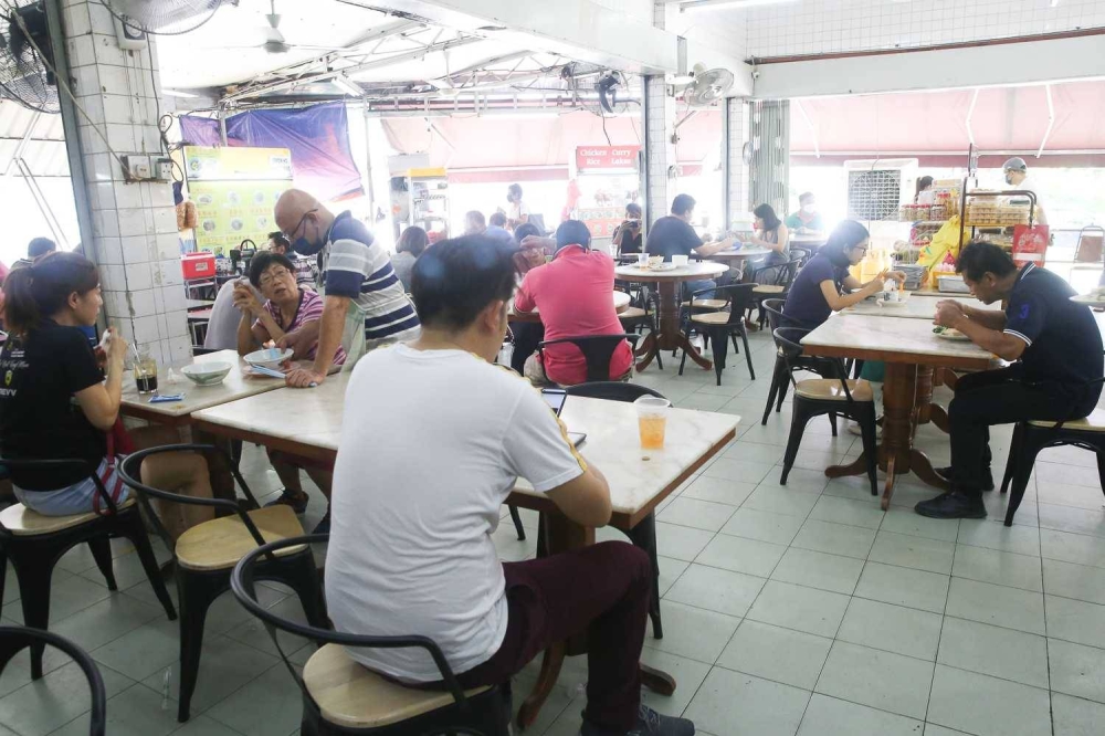 Customers can dine in for their 'chap fan' or order from the various stalls serving pork noodles, curry noodles and more.