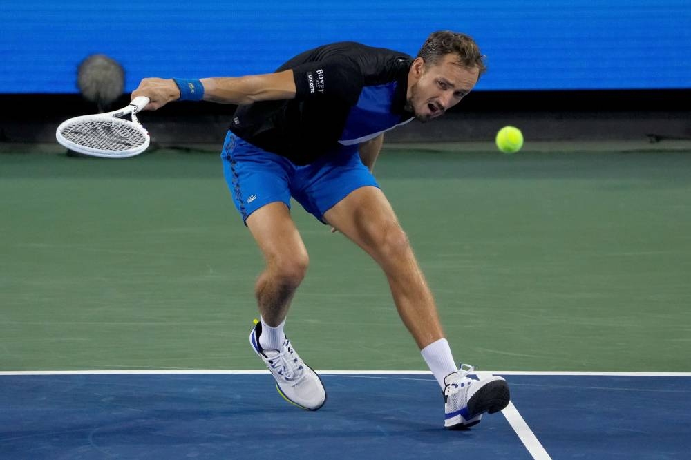 Daniil Medvedev plays a backhand during his match against Botic van de Zandschulp during the Western & Southern Open at the Lindner Family Tennis Centre, Cincinnati August 16, 2022. — AFP pic  