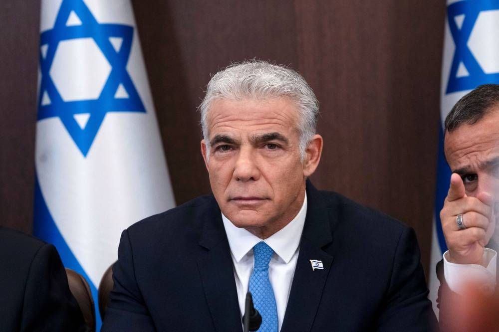 Israel's Prime Minister Yair Lapid's office confirmed the restoration of full diplomatic ties with Turkey. — Reuters pic