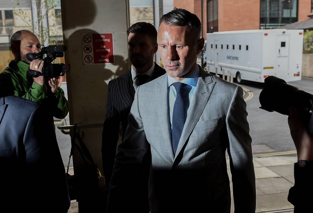 Former Manchester United footballer Ryan Giggs arrives at Manchester Crown Court August 17, 2022. — Reuters pic