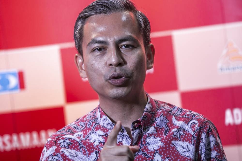 PKR communications chief Fahmi Fadzil speaks to the media at the press conference in Pakatan Harapan Media Centre at Metropolitan Square, Damansara Perdana, August 18, 2022. — Picture by Hari Anggara