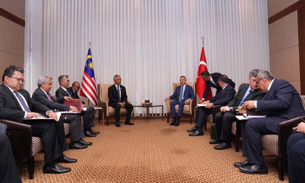 Yang di-Pertuan Agong Al-Sultan Abdullah Ri'ayatuddin Al-Mustafa Billah Shah with Turkey Vice President Fuad Oktay in Ankara August 18, 2022. ― Bernama pic
