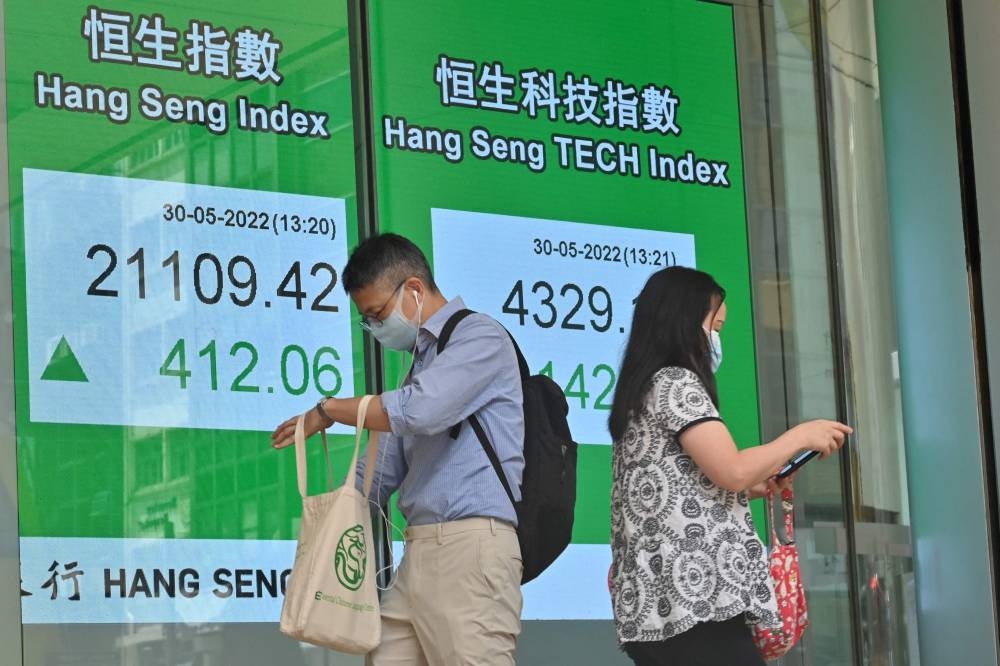 Asian markets drop as Fed minutes cause fresh rate hike woe | Malay Mail
