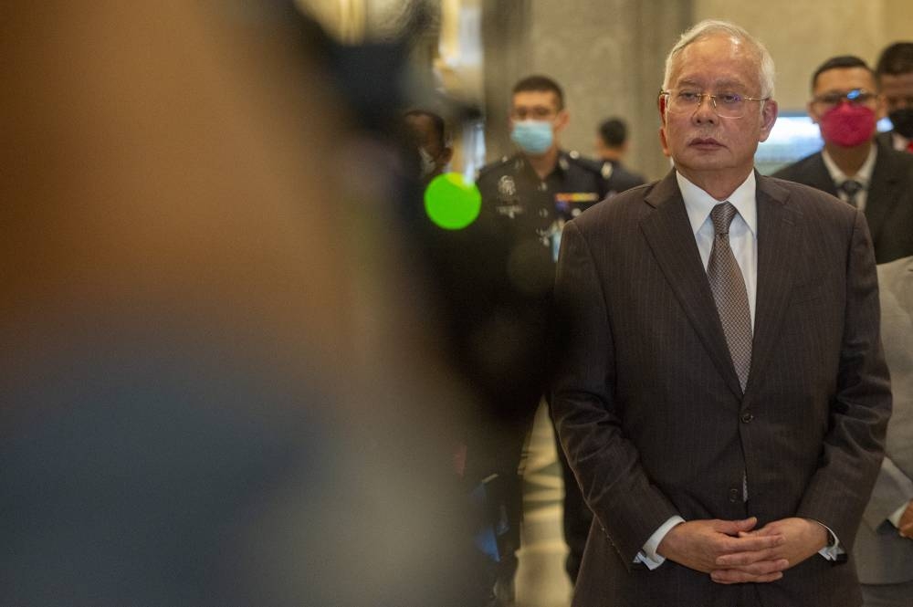 Datuk Seri Najib Razak is pictured at the Palace of Justice in Putrajaya, August 18, 2022. Stating that his right to life, liberty and a fair hearing was at stake, Najib said he wished to record his objections ‘in the strongest of terms’ in relation to the ongoing appeal.— Picture by Shafwan Zaidon