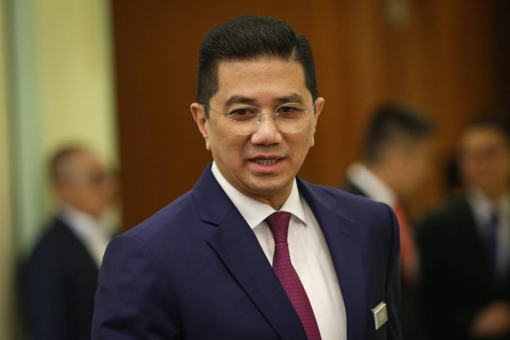 Senior Minister Datuk Seri Mohamed Azmin Ali said exports increased 38.0 per cent to RM134.07 billion, posting the 12th successive month of double-digit growth. —  Picture by Yusof Mat Isa