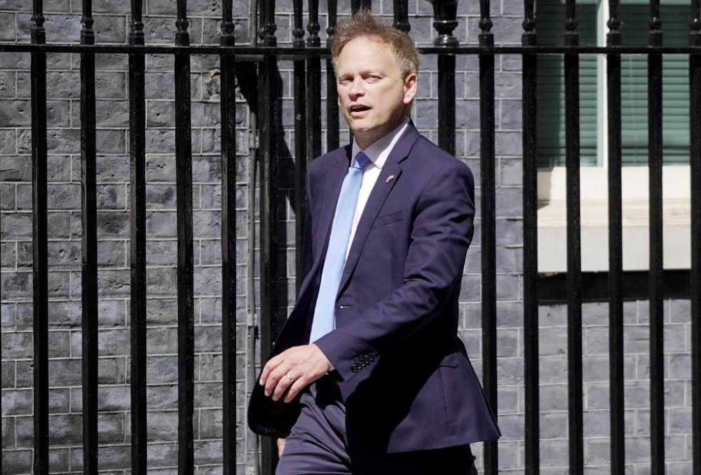 Britain's Transport Secretary Grant Shapps arrives at 10 Downing Street in central London on July 7, 2022, ahead of a meeting of the government's new Cabinet. — AFP pic