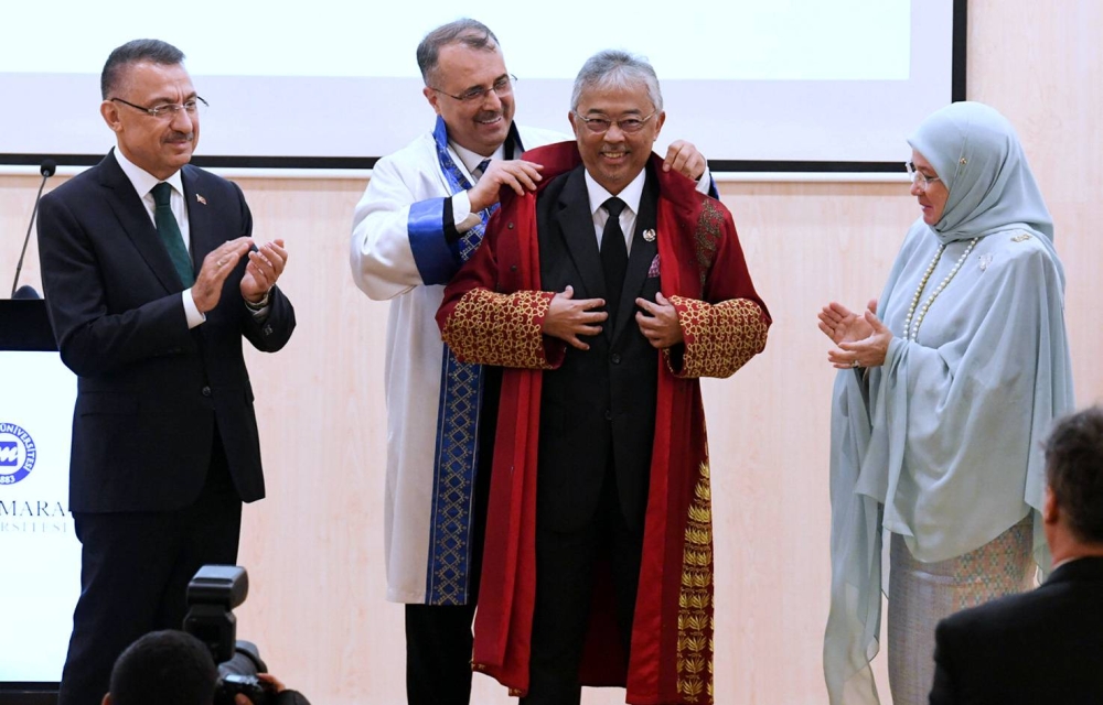 Marmara University Rector Prof Mustafa Kurt confers Yang di-Pertuan Agong Al-Sultan Abdullah Ri’ayatuddin Al-Mustafa Billah Shah with the honorary doctorate, Istanbul August 19, 2022. — Bernama pic