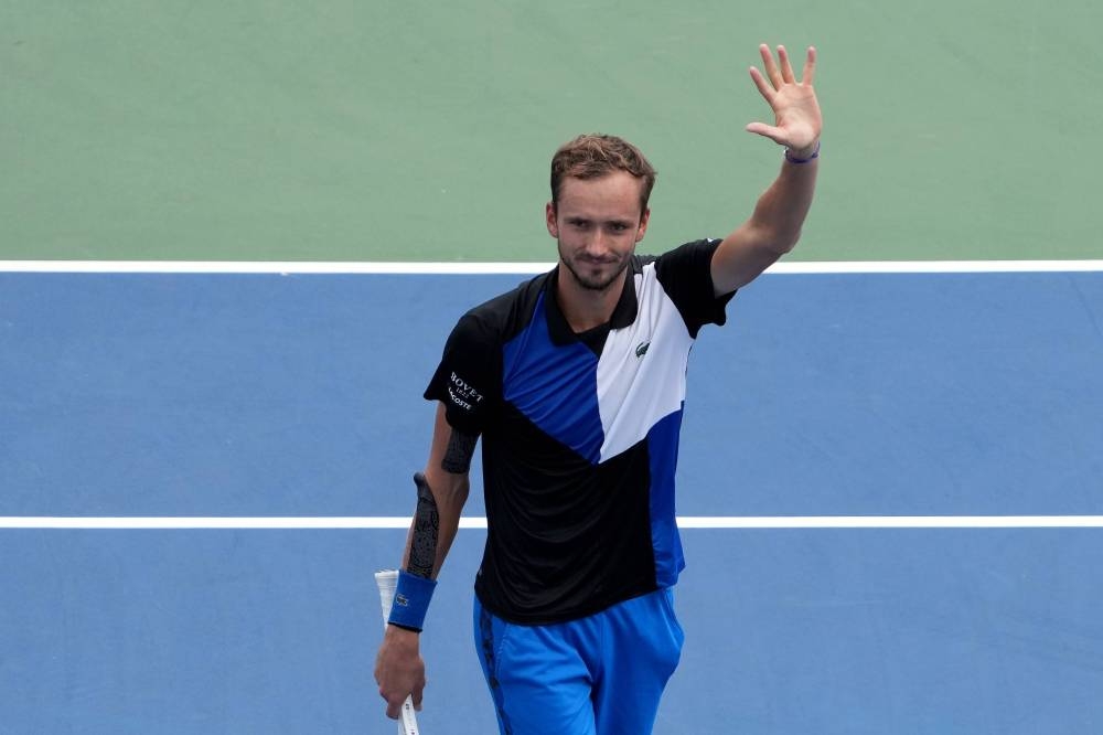 Daniil Medvedev of Russia celebrates after defeating Taylor Fritz of the United States in their Men's Singles Quarterfinal match on day seven of the Western & Southern Open at Lindner Family Tennis Center on August 19, 2022 in Mason, Ohio. — AFP pic