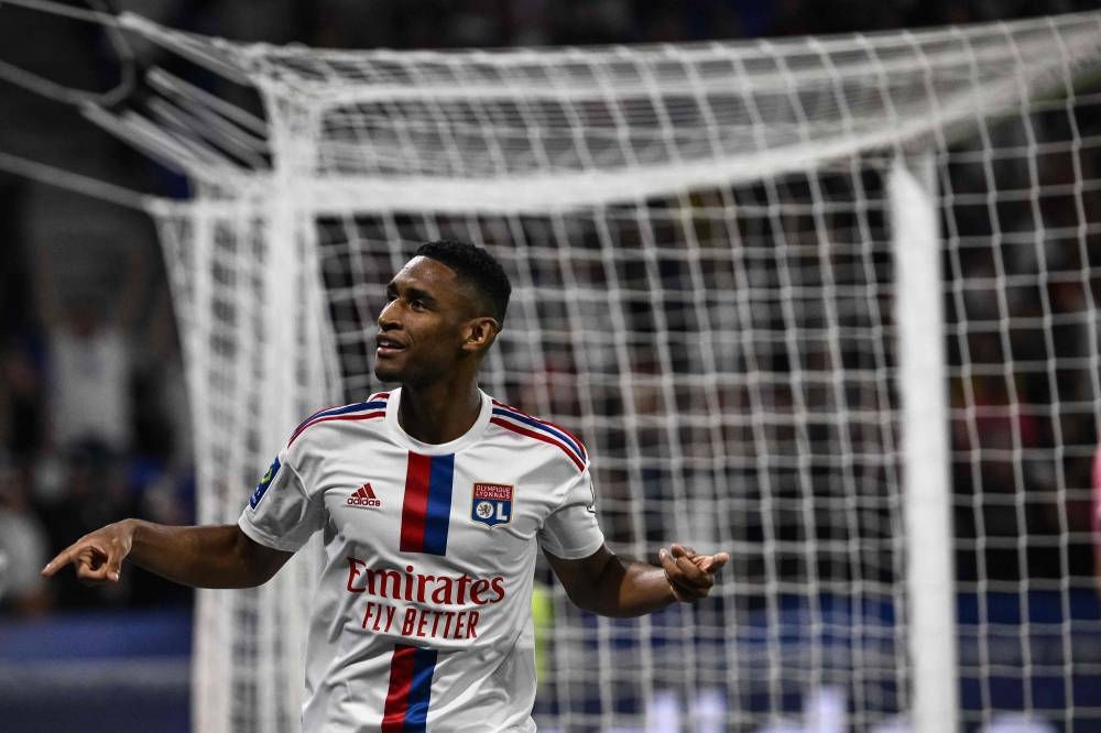 Lyon's Brazilian forward Tete celebrates after scoring his team's third goal during the French L1 football match between Olympique Lyonnais (OL) and ES Troyes AC at The Groupama Stadium in Decines-Charpieu, central-eastern France on August 19, 2022. — AFP pic