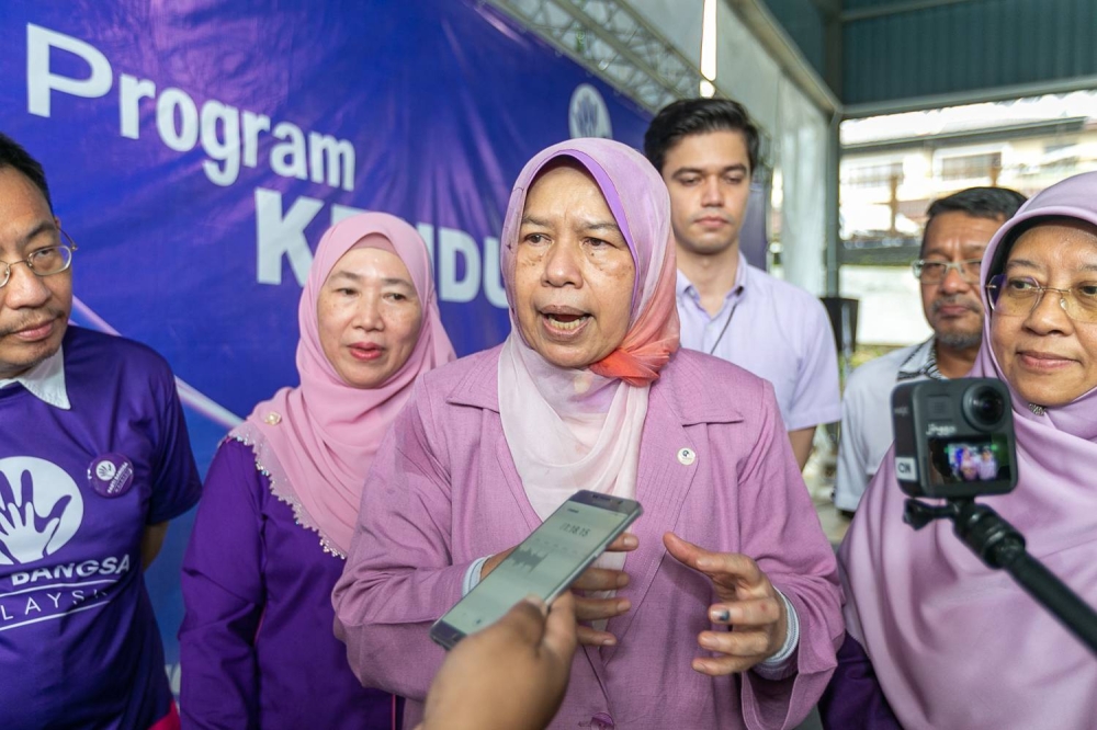 Parti Bangsa Malaysia President-designate Datuk Zuraida Kamaruddin speaks to the media after kicking off the party’s political tour to meet voters at Pangsapuri Seri Intan in Ampang August 20, 2022. — Picture by Devan Manuel