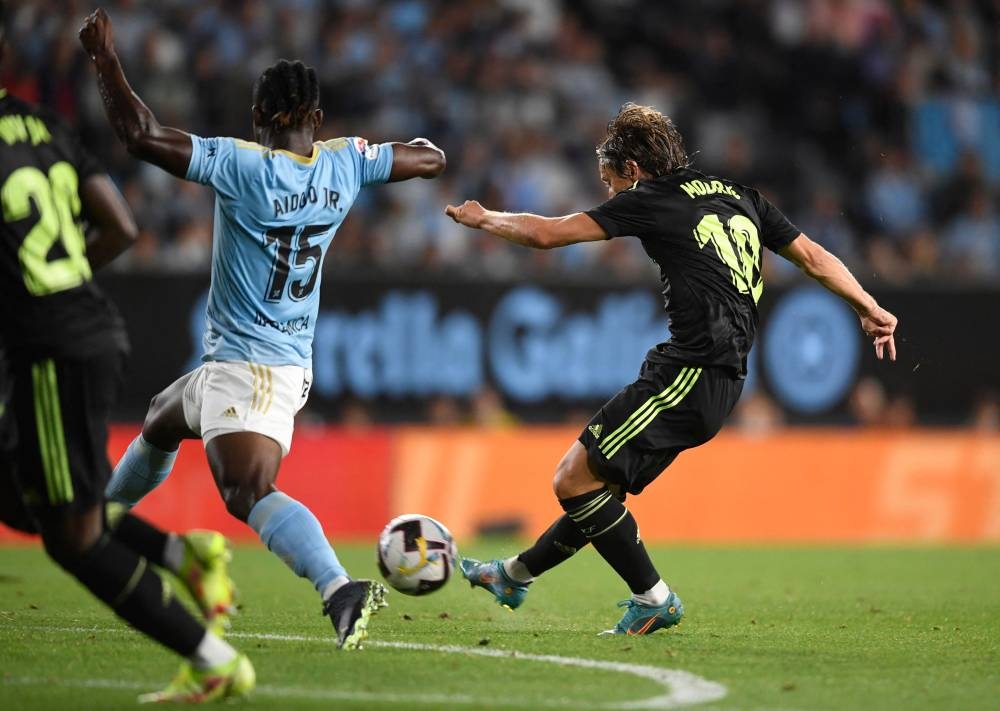 Real Madrid's Croatian midfielder Luka Modric scores his team's second goal during the Spanish League football match between RC Celta de Vigo and Real Madrid CF at the Balaidos stadium in Vigo on August 20, 2022. — AFP pic