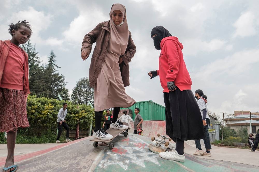 A girl skates in a skate park as part of a weekly training of the group Ethiopian Girls Skate, in Addis Ababa, Ethiopia, on July 30, 2022. — AFP pic