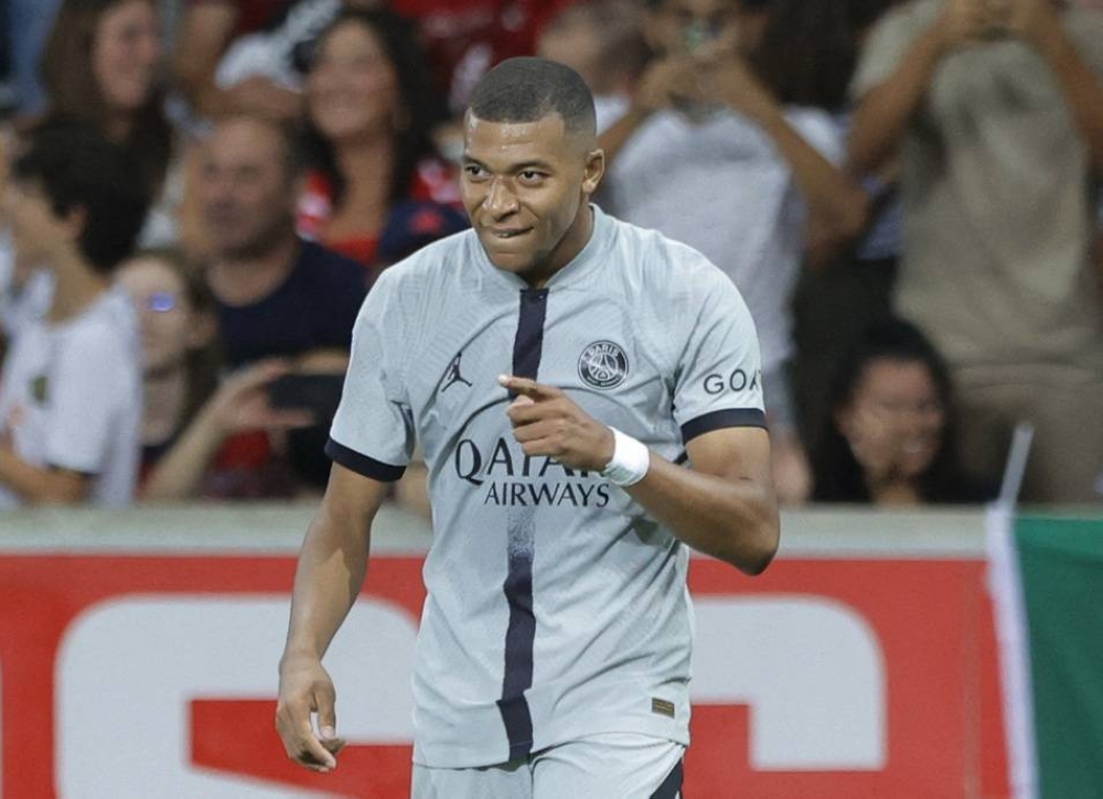 Paris St Germain's Kylian Mbappe celebrates scoring their seventh goal against Lille at Stade Pierre-Mauroy August 21, 2022. — Reuters pic
