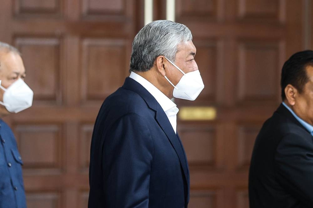 Umno president Datuk Seri Ahmad Zahid Hamidi leaves the Kuala Lumpur High Court after hi hearing August 22, 2022. — Picture by Sayuti Zainudin