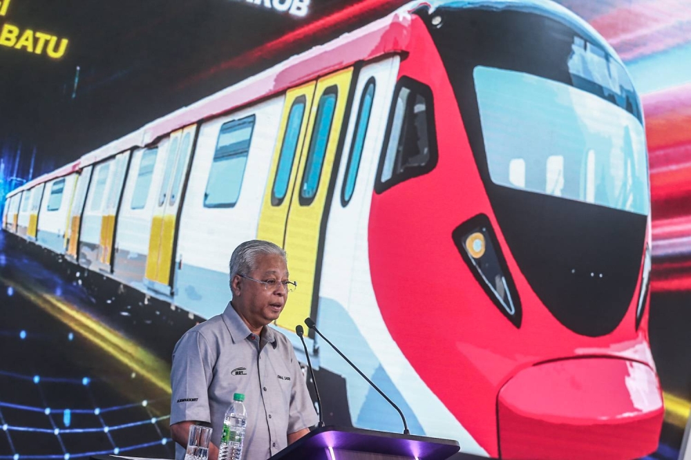Prime Minister Datuk Seri Ismail Yaakob speaks at the launch of the MRT Putrajaya Line Phase 1, June 16, 2022. Malaysia hopes to speed up the revival of the terminated High Speed Railway project with Singapore at the earliest date, said the PM today. — Picture by Hari Anggara  