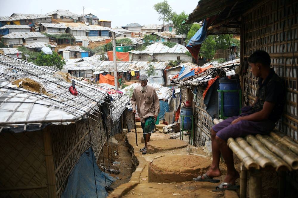 A Rohingya refugee walks at a refugee camp in Cox's Bazar, Bangladesh. — Reuters pic