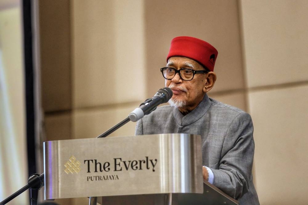 PAS president Datuk Seri Abdul Hadi Awang delivers a speech at the Everly Hotel in Putrajaya July 17, 2022. — Picture by Ahmad Zamzahuri