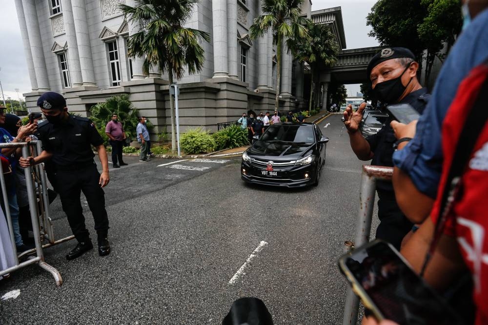 Vehicle carrying one of the judges is pictured leaving the compound of the Palace of Justice in Putrajaya, August 23, 2022. Bersih today said the Federal Court demonstrated that it would not submit to political or public pressure. — Picture by Sayuti Zainudin