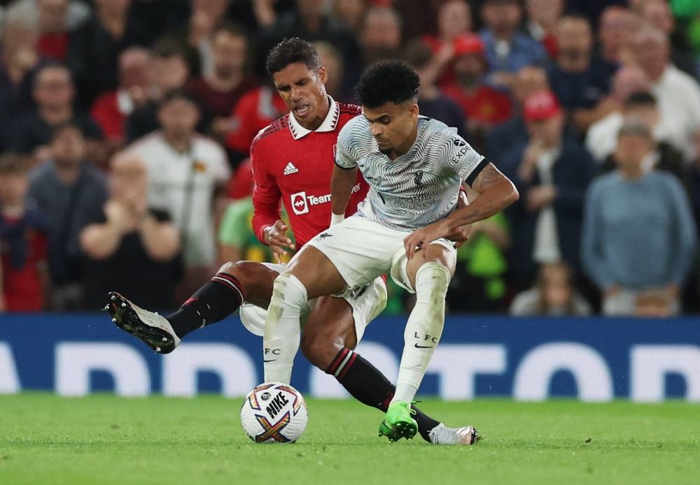 Manchester United’s Raphael Varane in action with Liverpool’s Luis Diaz at Old Trafford, Manchester, Britain, August 22, 2022. — Reuters pic 