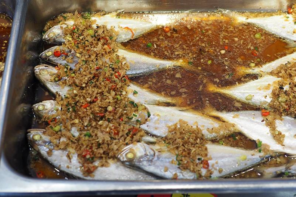 There's various fish dishes like this steamed version or even a sweet and sour fish for you to select from
