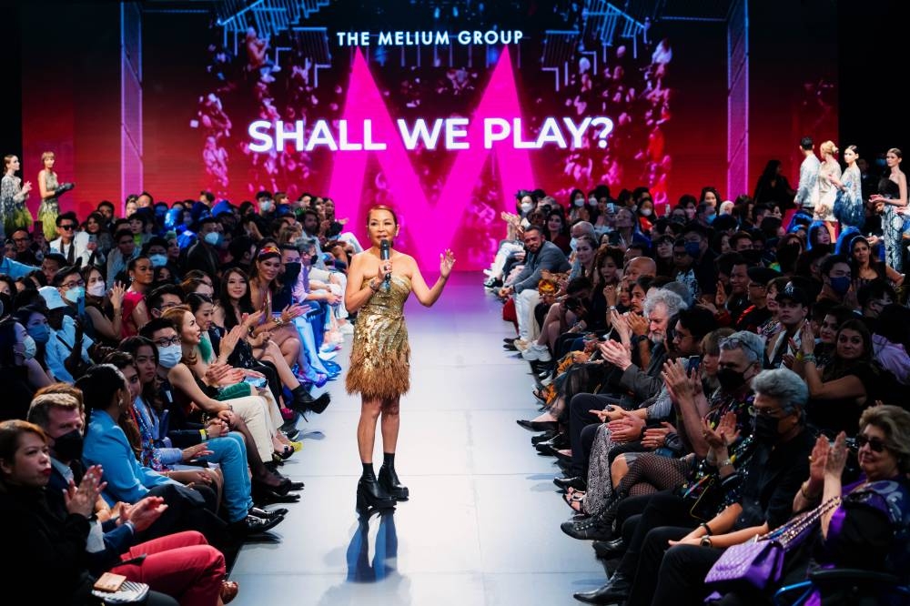 Melium founder Datuk Seri Farah Khan addressing the crowd. She also showcased her eponymous label on the runway. —  Picture by The Melium Group