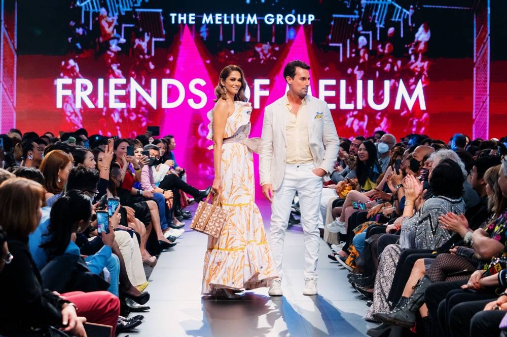Kavita Siddhu in Andres Otalora and Roberto Guiati in Hackett London. The power couple modelled on Melium’s fashion runway. —  Picture by The Melium Group
