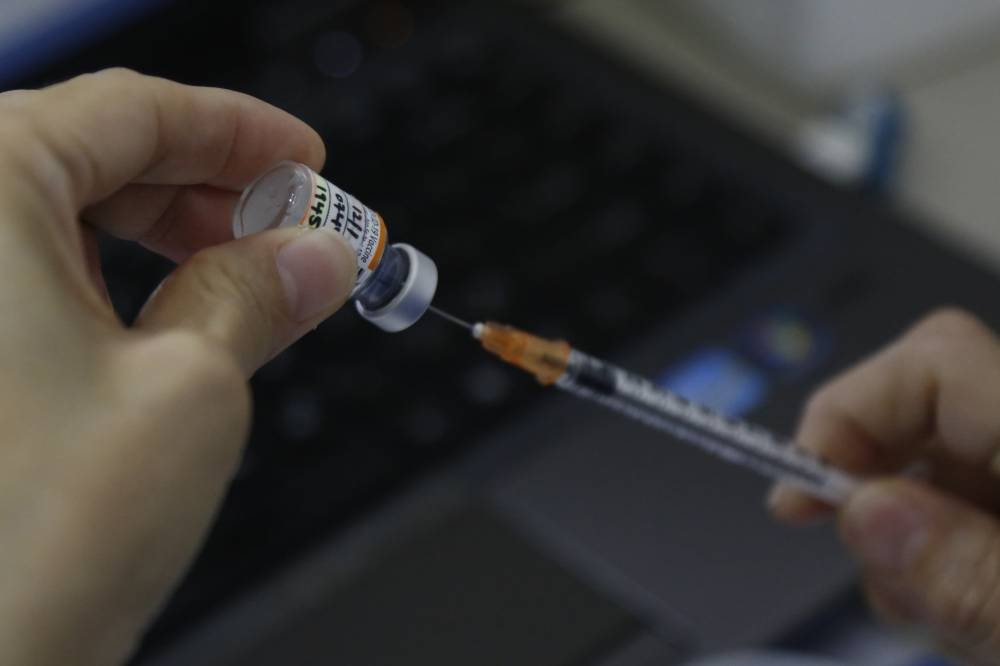 Based on the hospitalisation rates, the vaccine that will be offered to young children aged between six months and five years old will be beneficial and reduce the risk of a severe infection, Associate Professor Kenneth Mak said. — TODAY pic